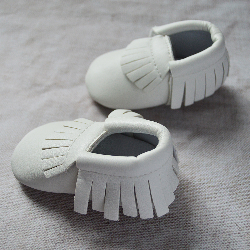 Baby’s White Moccasins