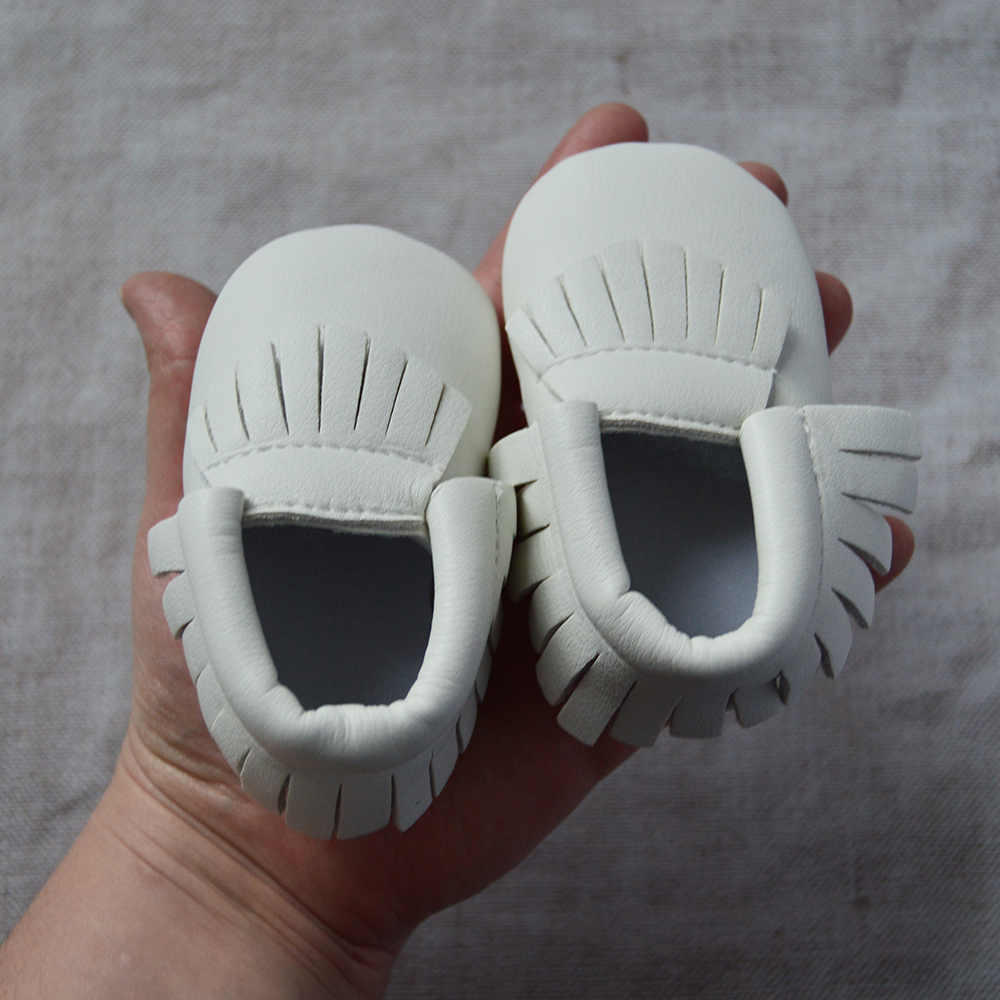 Baby’s White Moccasins