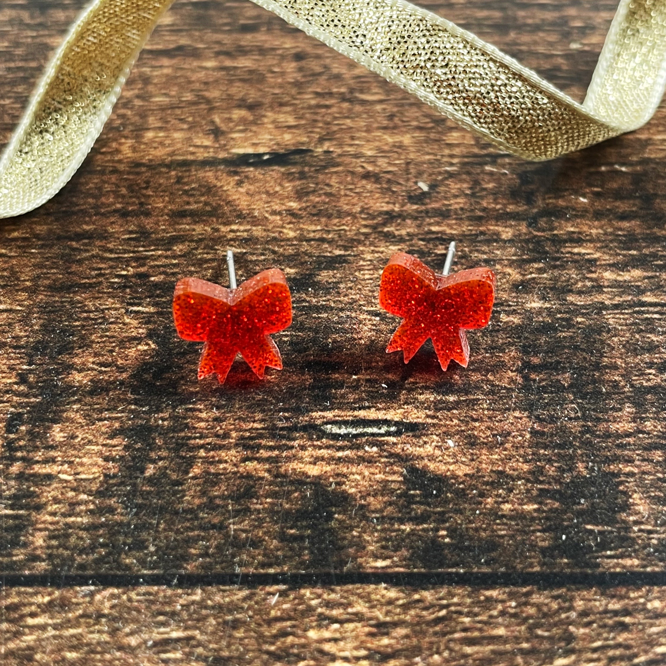red_glitter_bow_studs
